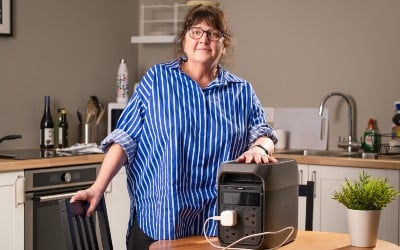 SSEN Distribution's Networks Priority Services Manager Rosemary Butcher with one of the 20,000 home battery packs SSEN Distribution will supply to certain customers.