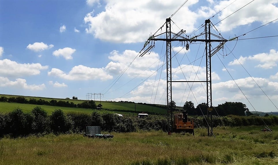 Landscape with H towers and overhead lines