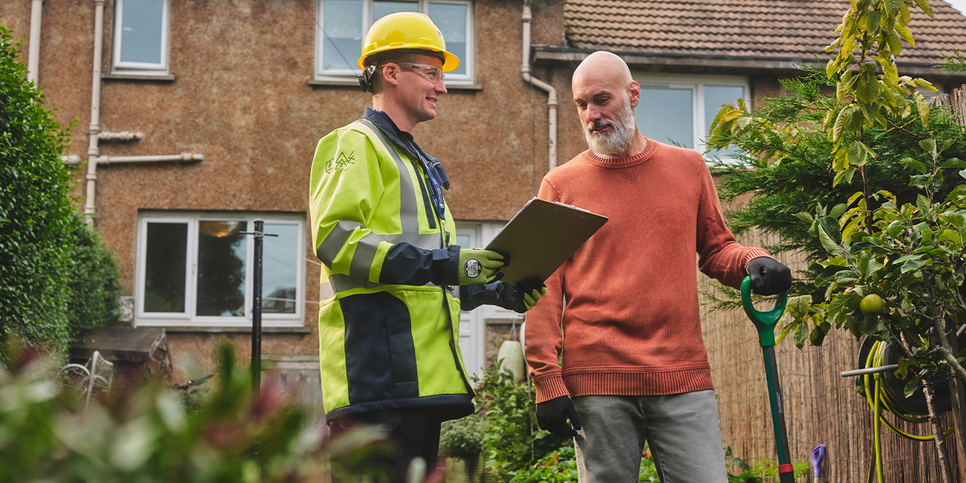 SSEN engineer engaging with member of public on safety
