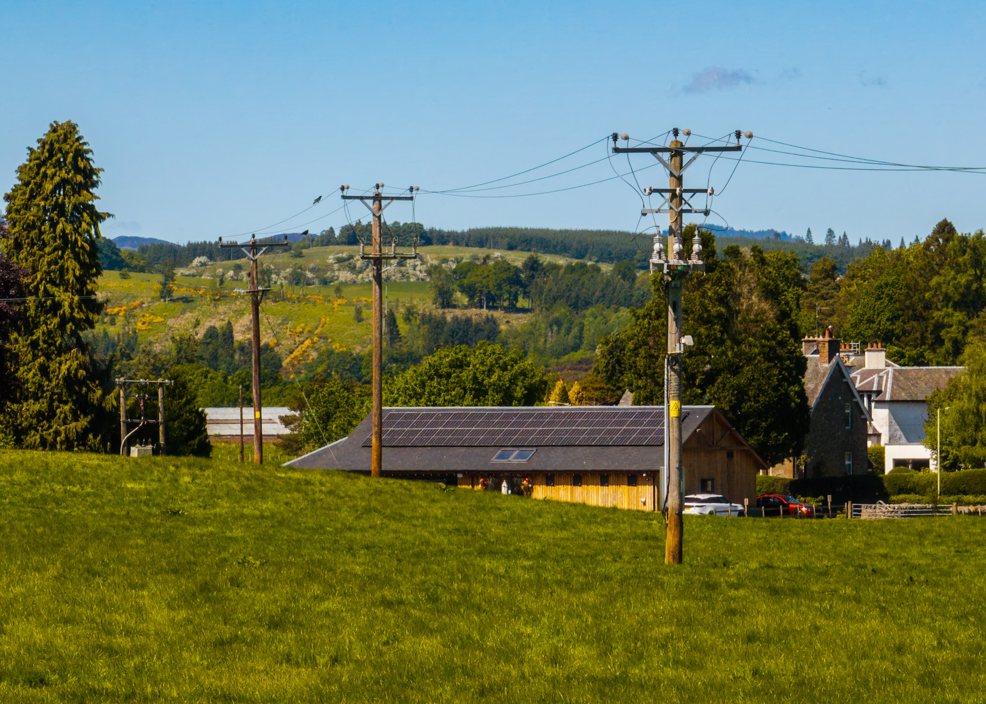The electricity distribution network running through a rural area