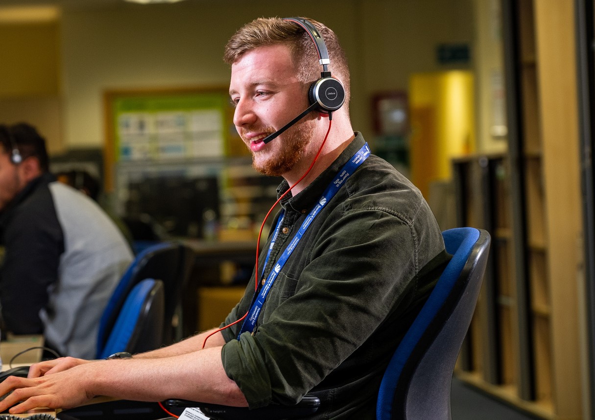 SSEN employee talking to a customer on the phone at SSEN's Customer Contact Centre