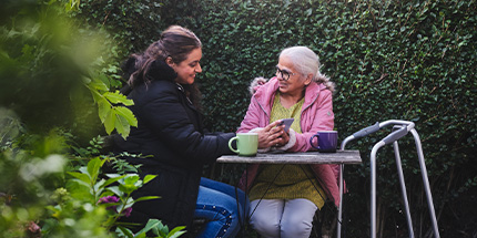 Family sitting on couch taking selfie