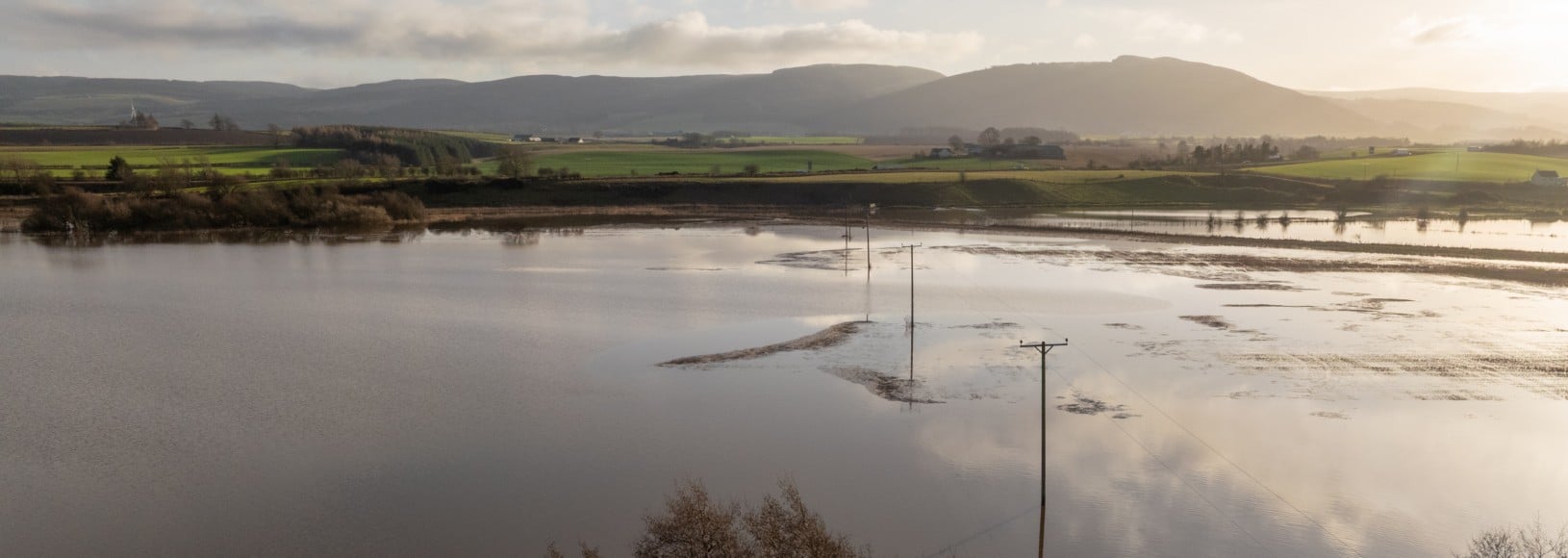 An aerial view of the distribution network passing through a flood plain