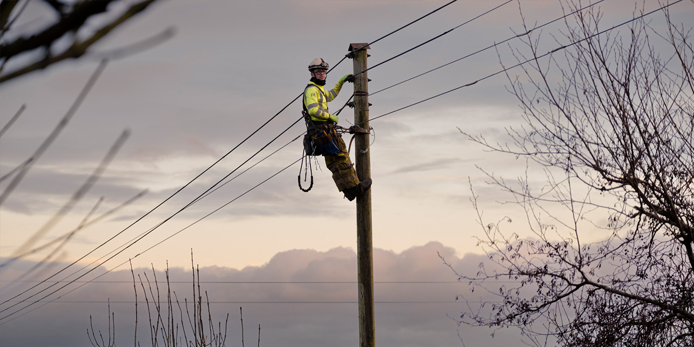 Engineer restoring electricity during storm gerrit
