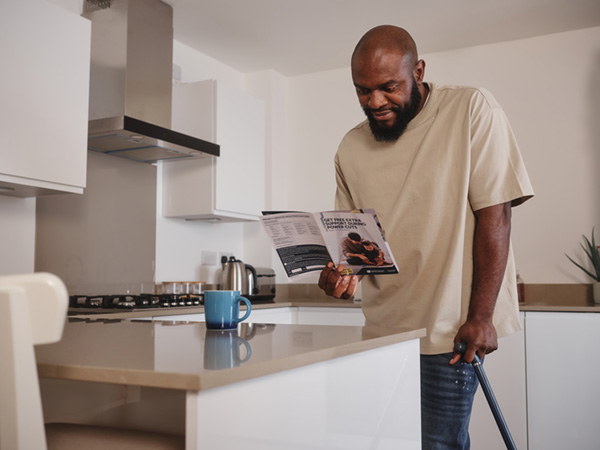 Customer reading PSR leaflet