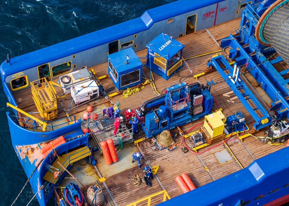 A close up of the deck of a cable-laying vessel