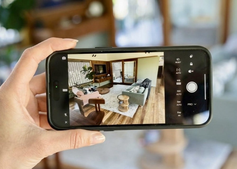 An image of a smartphone being used to gather footage inside a property