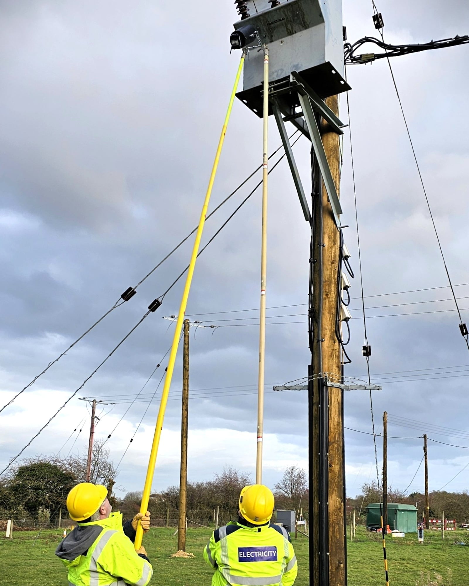 SSEN linespeople testing the lancet tool on the live network