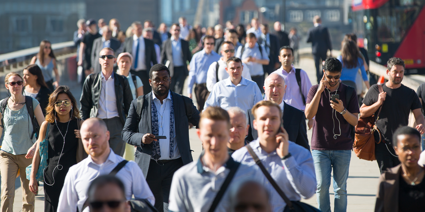 Image of people walking down busy street in London
