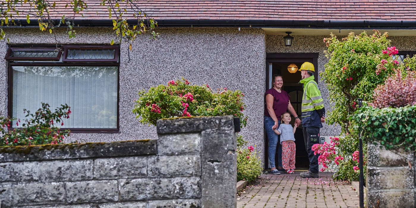 SSEN staff member speaking to customer