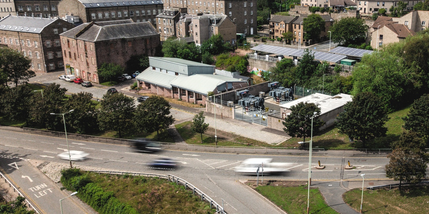 An aerial view of an SSEN Distribution substation and the community it serves
