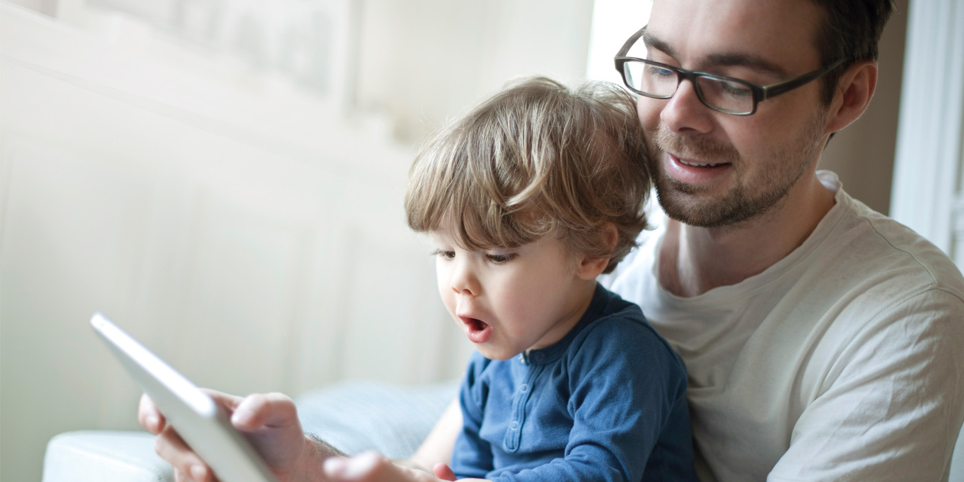 Father and son playing together