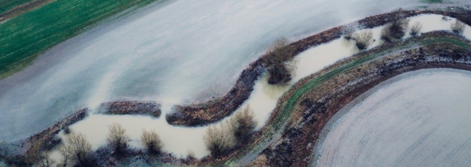 Aerial view of fields flooded by the River Evenlode