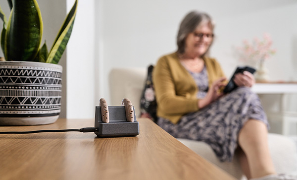 Hearing aids with customer in background