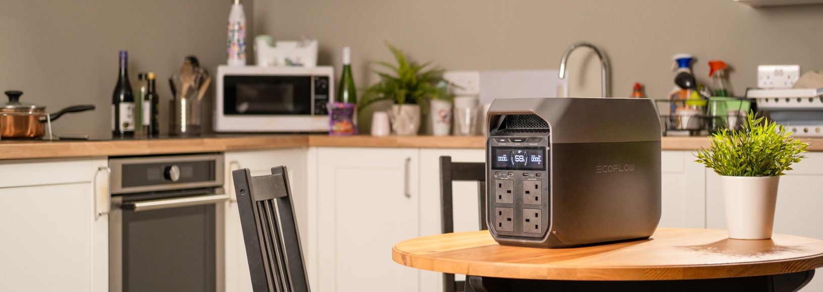 The battery being supplied to customer sitting on a kitchen table