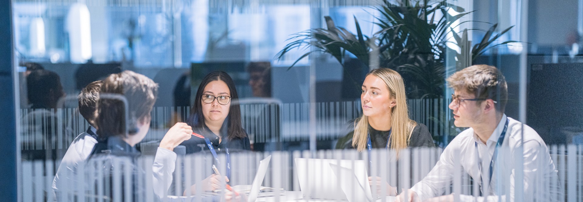 SSEN Employee talking to customer who is holding their baby.