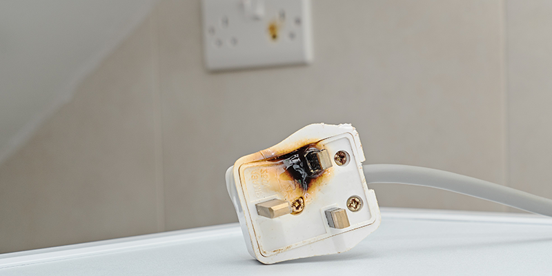 Image of a burnt electricity plug 
