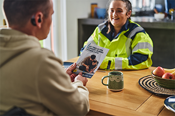 woman in high vis with customer