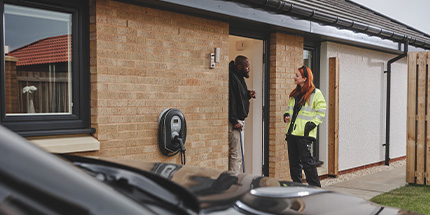 Customer at door with staff member