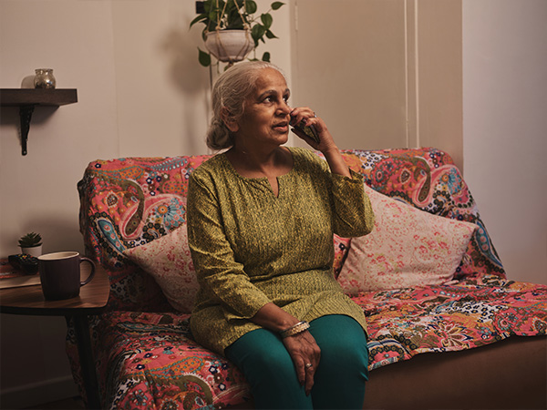 Customer on phone to YES energy solutions